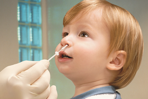 Child taking COVID test